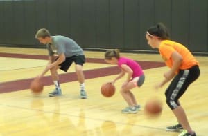 CAMP MEMBERS PRACTICE BALL HANDLING SKILLS