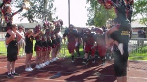 THE PANTHERS COMING ONTO THE FIELD.