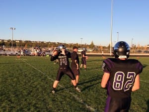 JACOB JOHNSON WARMS UP BEFORE THROWING 8 TDS.