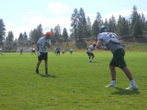 KADEN WADSWORTH AND CORNER TROY VIOLA FACE OFF DURING PRACTICE.
