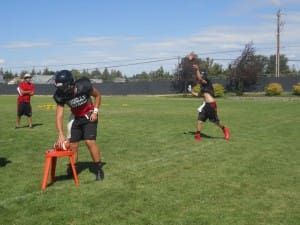 MOUNTAIN VIEW QBS TAKE AIM AT THE THROWING NET.