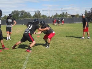 SENIOR TIGHT END RAY FUNK DRILLS WITH A TEAMMATE.