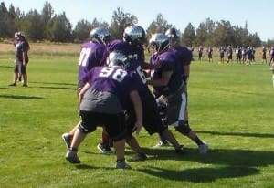 THE O-LINE PRACTICING BLOCKING SCHEMES