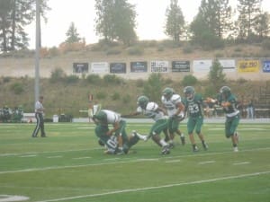 THOMAS CARTER GETS UPENDED BY PARKROSE AFTER A RECEPTION.